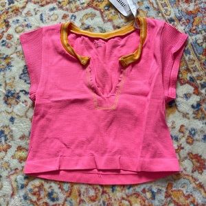 NWT orange and pink urban go for gold top